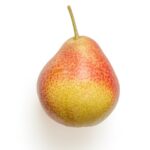 yellow and red round fruit